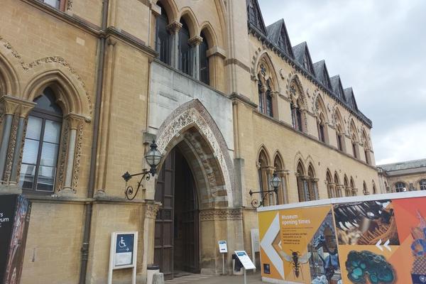 A view of the Main Museum entrance with signs pointing to the accessible entrance